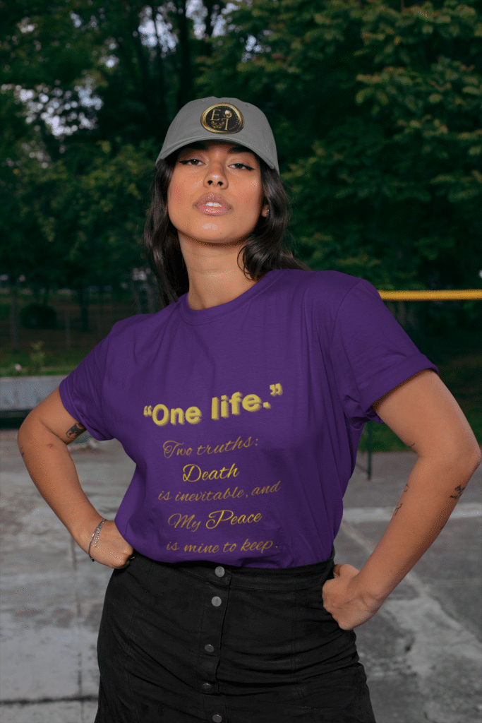 About Essence Innovation Woman in black high-waisted jeans wearing a purple “One Life” Essence Innovation t-shirt with gold inspirational quote.