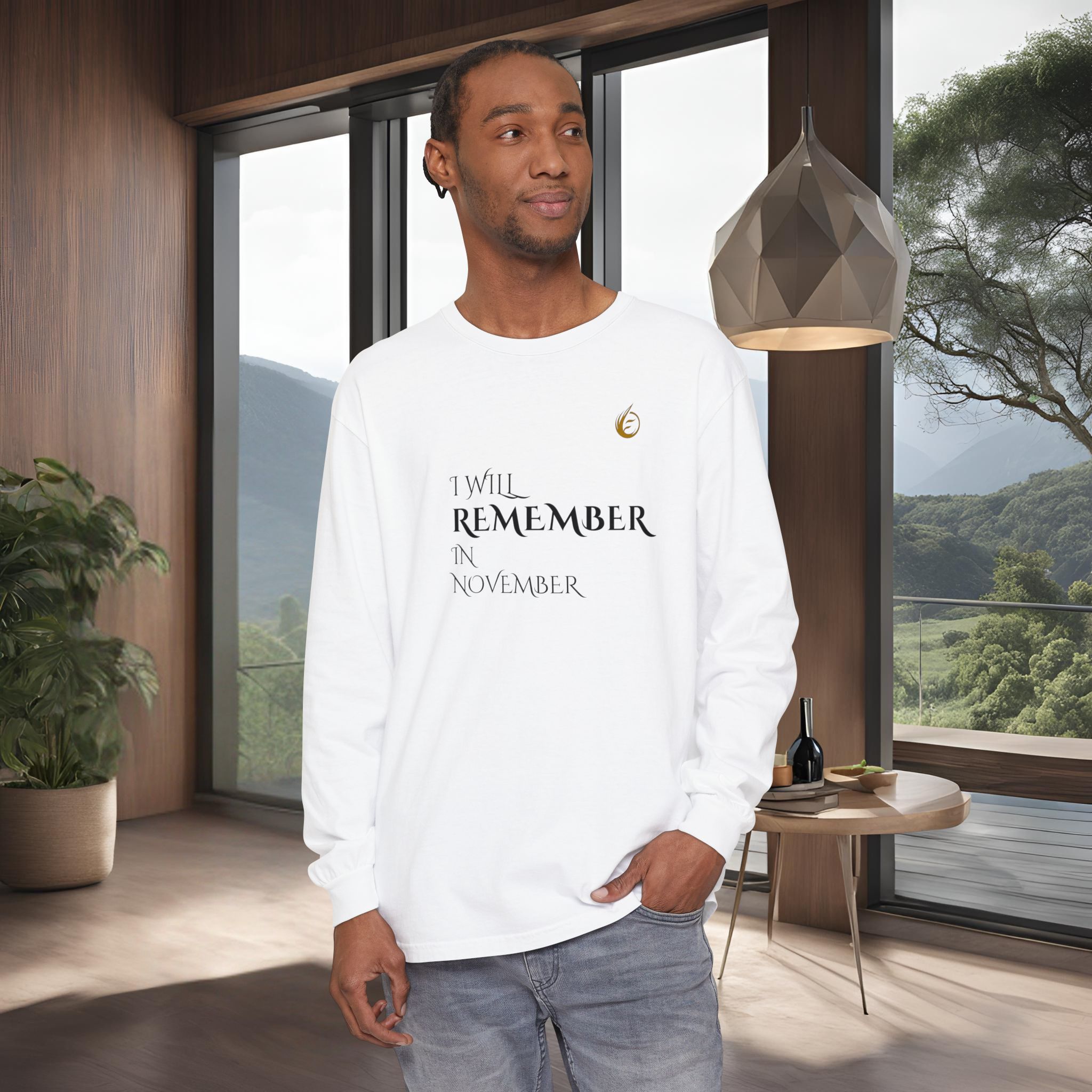 1961676137613550118_2048_customjpeg - Essence Innovation Portrait of a man wearing a white long‑sleeve shirt indoors, standing near a large window with a geometric pendant lamp nearby.