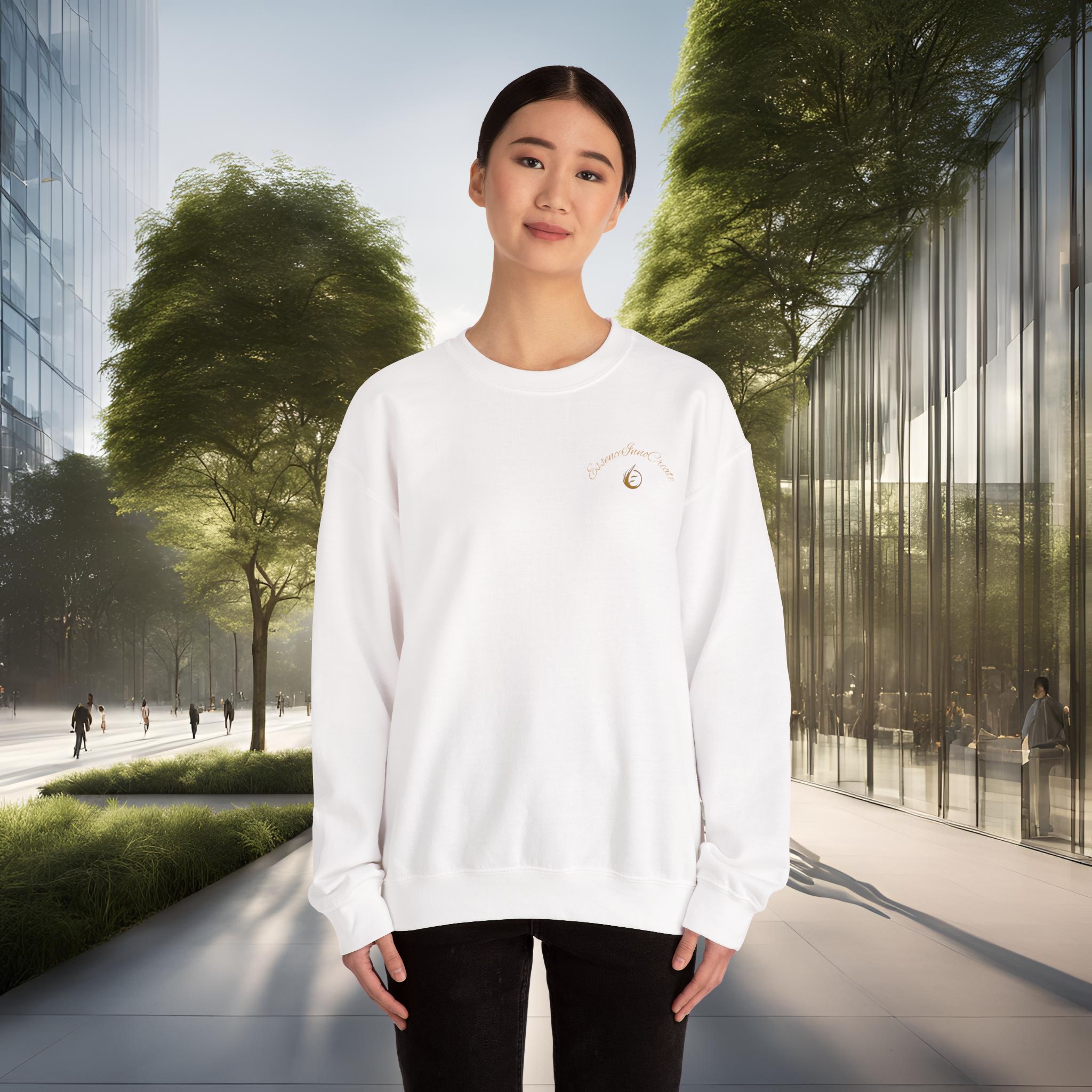 4678195736573357846_2048_customjpeg - Essence Innovation Portrait of a woman wearing a white sweatshirt standing outdoors with glass office buildings and trees behind her.