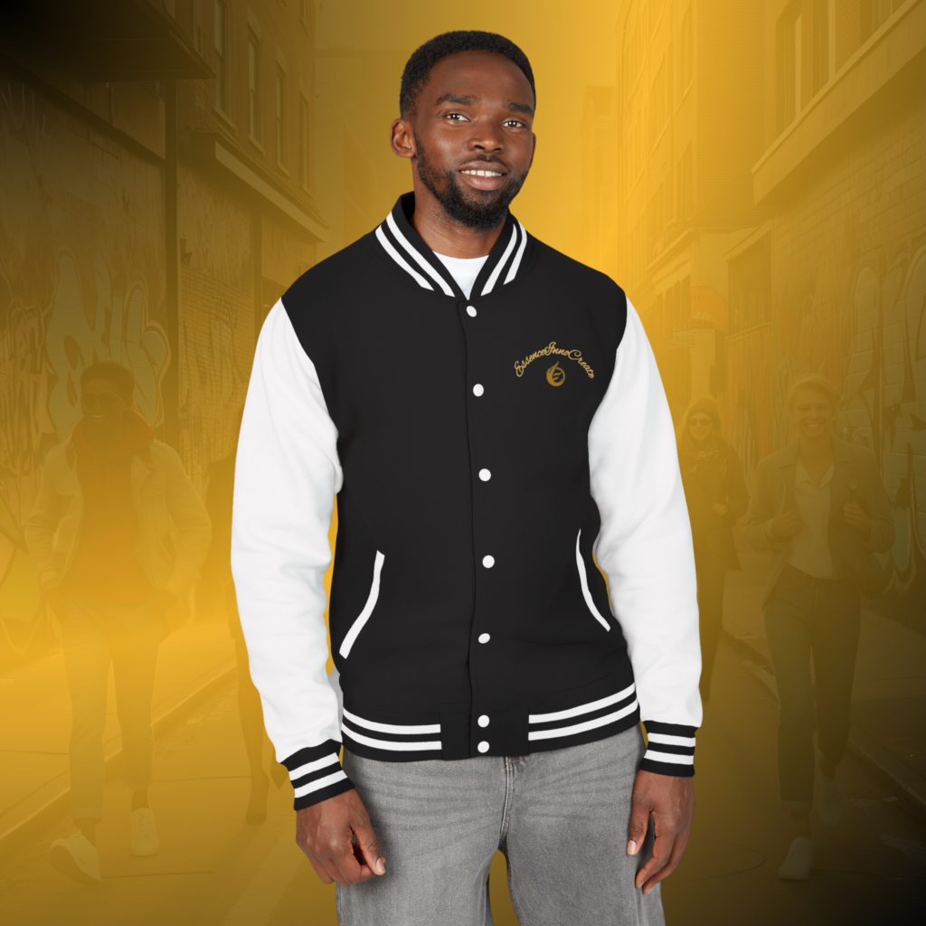 EI-AI-IMG-001 - Essence Innovation Portrait of a man wearing a black and white varsity jacket, standing in a city alley with a yellow overlay.