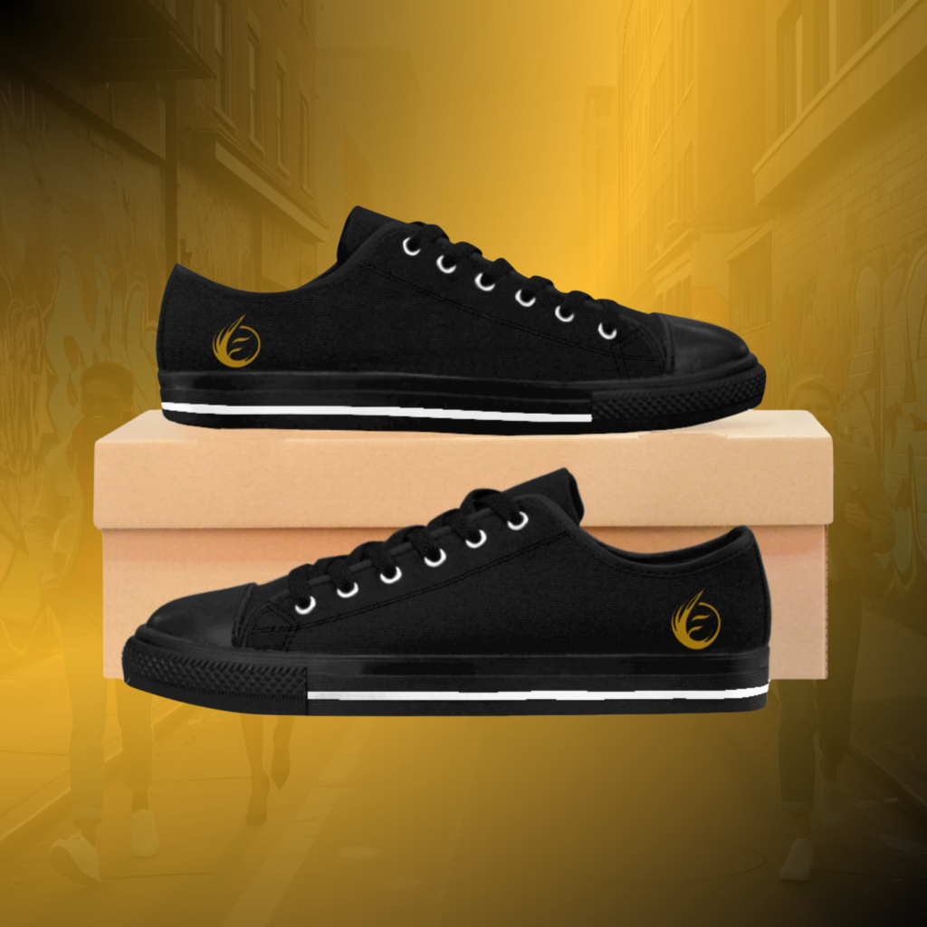 EI-AI-IMG-004 - Essence Innovation Black low-top sneaker rests on a cardboard shoebox with a yellow urban background.