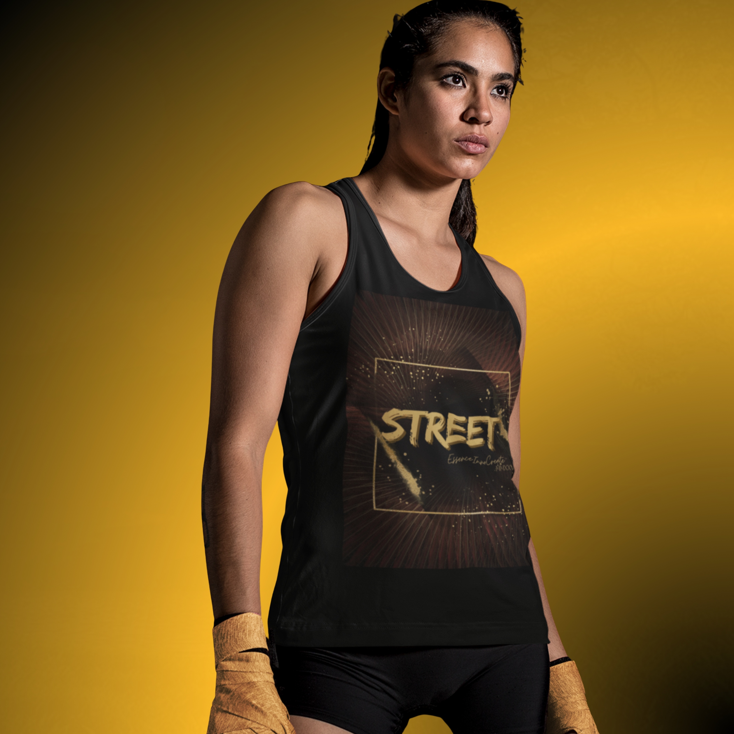 T0789 - Essence Innovation Athlete standing against a yellow gradient, wearing a black sleeveless top and hand wraps on both wrists.